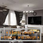 Asztali és kanapé a dekoratív kandallóval szemben