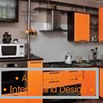 Stílusos konyha fekete és narancssárga színben