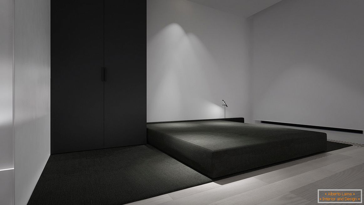 A minimalizmus stílusában lévő hálószoba a legapróbb példa a design funkciónak. A fő jellemző a bútorok minimuma.