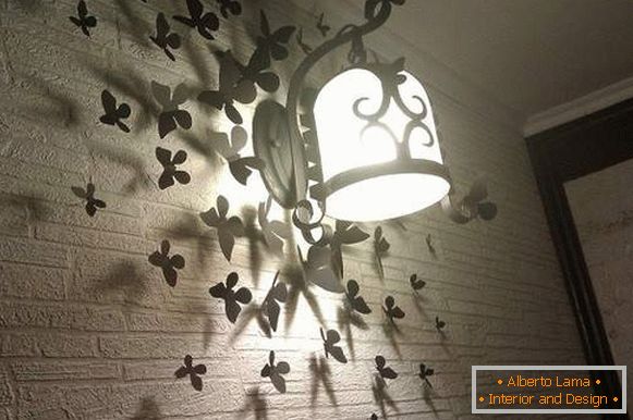 Érdekes ötletek a saját kezű házhoz - egy öngyújtású lámpa fotó a falon
