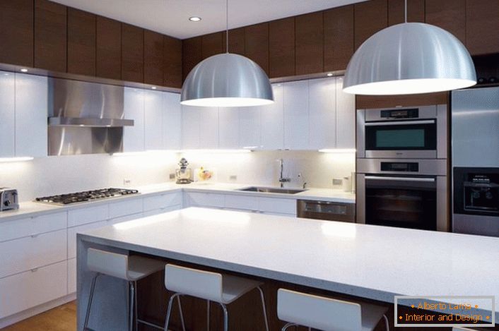 Tervező megoldás a minimalizmus stílusában egy tágas, világos konyha számára. 