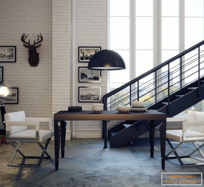 Loft stílus könnyű és elegáns. Festse a falakat, helyezze a modern bútorokat lakonikus formákba, a fényképet belülre.
