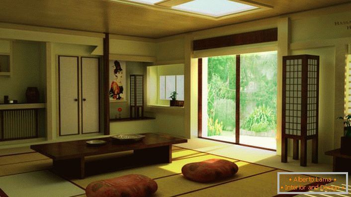 A japán minimalizmus jelenlétéről a vidéki ház nappalijában a megfelelő bútorokról van szó. Az alacsony asztal ideális otthoni teafogyasztásra. 