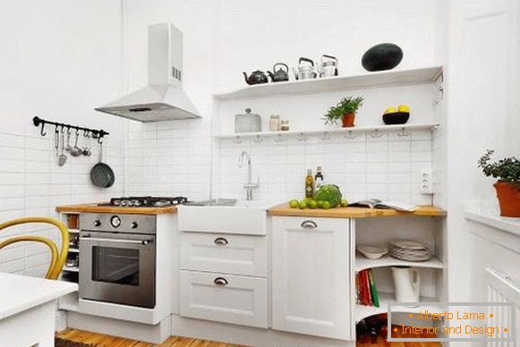 Фото необычного ésнтерьера кухнés в белом цвете