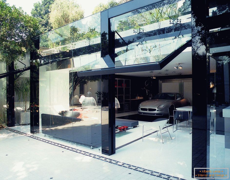 Modern garázs üveg kapukkal