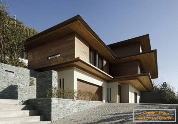 Gyönyörű modern stílusú háromszintes ház