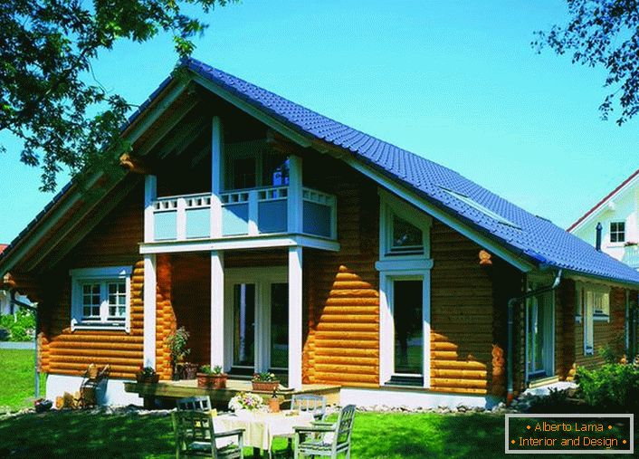 Skandináv ház rönkházból - a külvárosi ingatlan leggyakoribb változata. A vonzó külső és a viszonylag alacsony építési ár mellett a skandináv stílusú házak népszerűek és igényesek.
